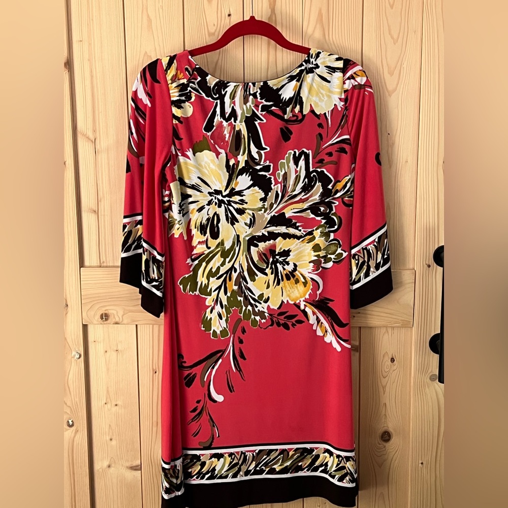 Colorful and comfortable dress.  Polyester stretch.
